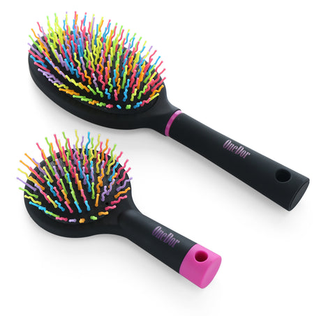 #24544: Rainbow colored stiff bristle brush with plastic handle